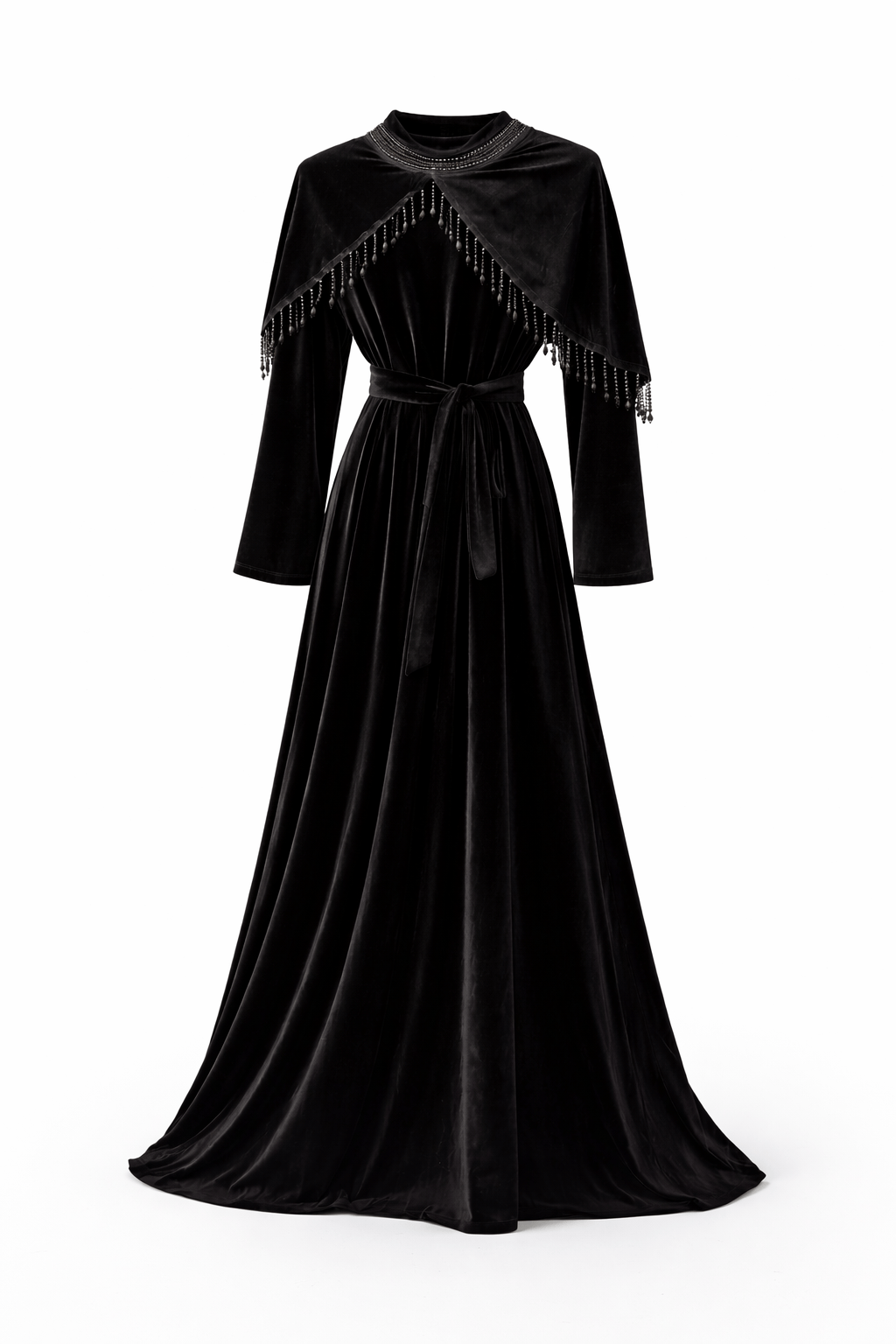 Black velvet dress with fringe details on a white background