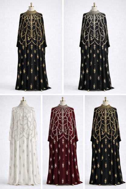 Set of four long dresses on mannequins with intricate designs in black, white, and red.