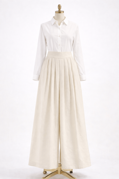 White shirt and beige pant on a mannequin against a white background