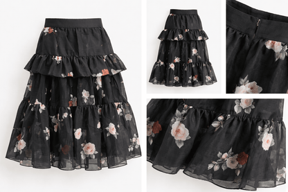 Black floral tiered skirt with close-up details on a white background