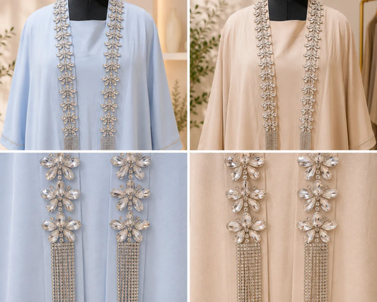 Two dresses in light blue and beige with decorative embellishments on a neutral background.