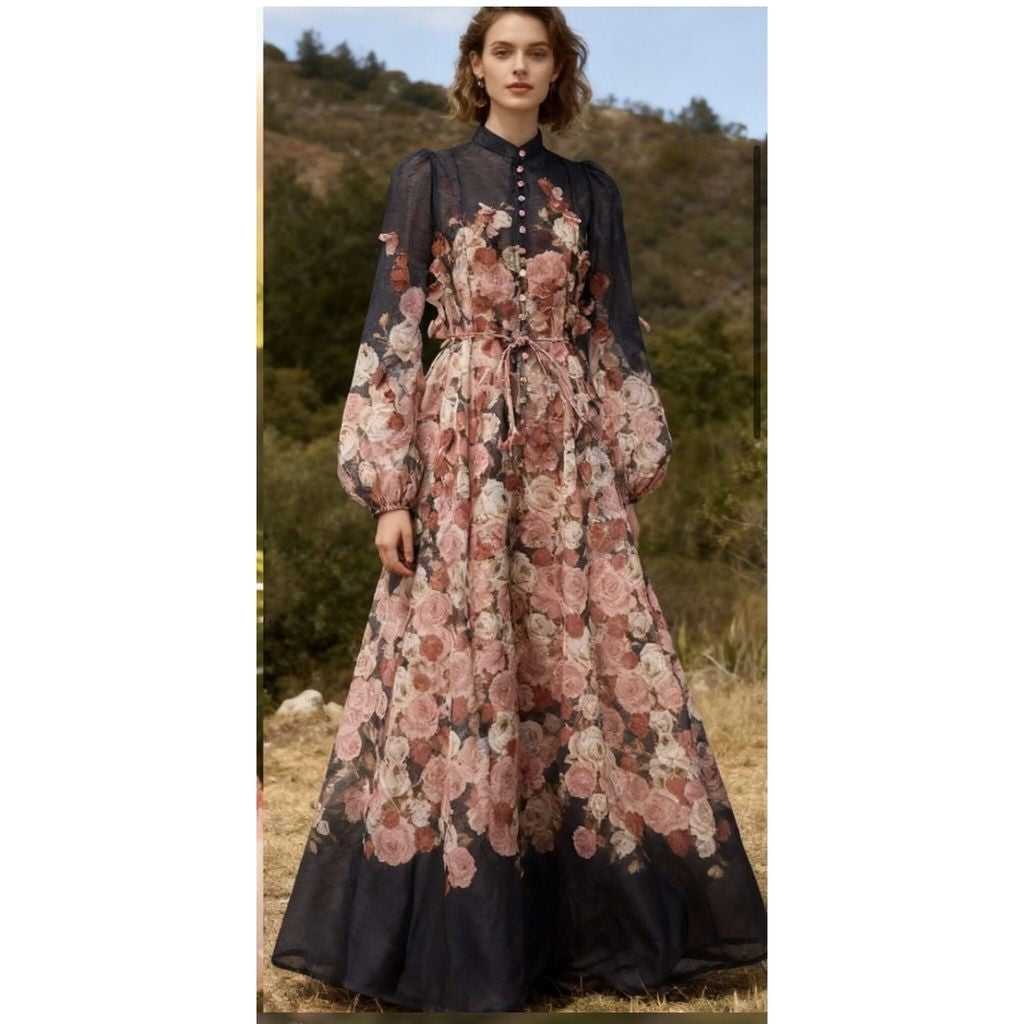 Woman wearing a floral dress with a mountainous background