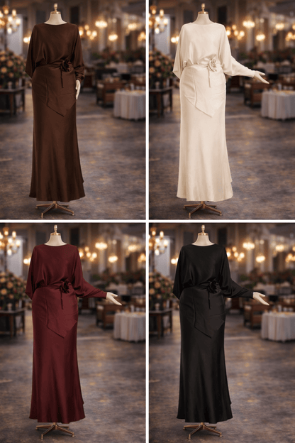 Four dresses in different colors displayed on mannequins against a formal event backdrop.
