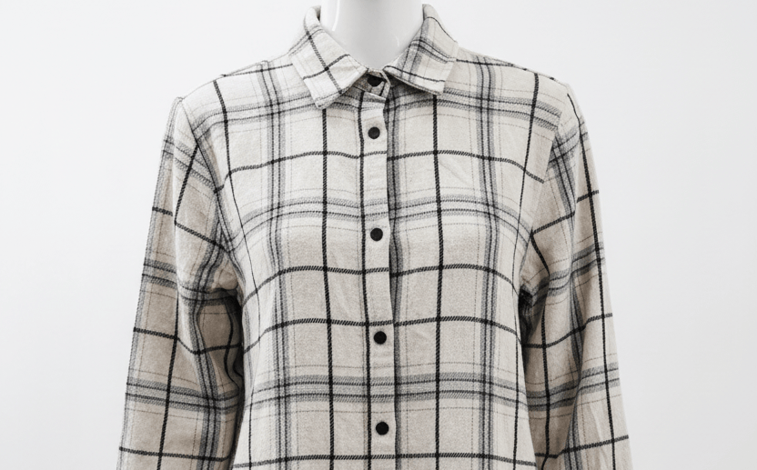 Plaid shirt on a mannequin against a white background